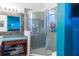This remodeled bathroom features a shower with glass doors, and a built-in vanity at 19279 Stone Hedge Dr, Tampa, FL 33647