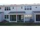 Townhome with large sliding doors leading to the patio and backyard at 19279 Stone Hedge Dr, Tampa, FL 33647