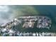 Overhead view of waterfront homes with boat docks and easy access to the open water and neighborhood streets at 3192 Gulf Winds Cir, Hernando Beach, FL 34607