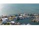 An aerial view of waterfront homes in a coastal community with private docks and Gulf access at 3192 Gulf Winds Cir, Hernando Beach, FL 34607