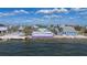 View of 65 feet of Gulf frontage, showcasing the home's waterfront location and outdoor space at 3192 Gulf Winds Cir, Hernando Beach, FL 34607