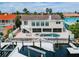 Aerial view of the back of the house and dock showing the pool, spa, and waterfront location at 3545 Seaway Dr, New Port Richey, FL 34652