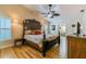 Spacious main bedroom with vaulted ceiling, wood floors, and comfortable furnishings at 3545 Seaway Dr, New Port Richey, FL 34652