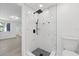 Shower features black hardware, stylish tile, and glass surround at 3553 Delta Pl, Holiday, FL 34691