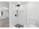 Shower features black hardware, stylish tile, and glass surround at 3553 Delta Pl, Holiday, FL 34691