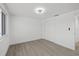 Bedroom features plank flooring, recessed lighting and ample closet space at 3553 Delta Pl, Holiday, FL 34691