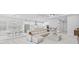 Expansive living space seamlessly integrates dining and kitchen areas for modern living at 3966 Tour Trce, Land O Lakes, FL 34638