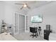 Versatile home office space with French doors, neutral tones, and functional layout at 3966 Tour Trce, Land O Lakes, FL 34638