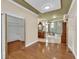 View from Dressing Room to Primary Bathroom with Marble Floors at 4404 Lake In The Woods Dr, Spring Hill, FL 34607