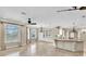 Bright kitchen with tile flooring, a center island, and ample natural light at 4404 Lake In The Woods Dr, Spring Hill, FL 34607