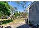 A view of the spacious backyard featuring lush greenery at 5704 Bratton Dr # 2, Tampa, FL 33617
