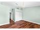 A clean bedroom with modern wood floors and a double door closet at 5704 Bratton Dr # 2, Tampa, FL 33617