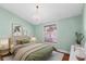 Bedroom with vaulted ceiling, decorative chandelier, and a bright window at 5704 Bratton Dr # 2, Tampa, FL 33617