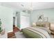 Bedroom with hardwood floors, closet, and lots of light at 5704 Bratton Dr # 2, Tampa, FL 33617