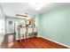 Cozy kitchen with counter seating, stainless steel appliances, and hardwood floors at 5704 Bratton Dr # 2, Tampa, FL 33617