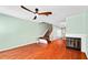 Well-lit living room with staircase, fireplace, and views into dining area at 5704 Bratton Dr # 2, Tampa, FL 33617