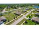 Aerial view showcasing a property's location within a community, highlighting its large backyard at 733 Garden Oaks Sq, Seffner, FL 33584