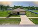 Aerial view of a well-maintained property with a spacious yard and convenient location at 733 Garden Oaks Sq, Seffner, FL 33584