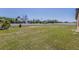 Expansive backyard featuring a large grassy area and privacy fence, perfect for outdoor activities at 733 Garden Oaks Sq, Seffner, FL 33584