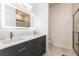 This bathroom features a double vanity and an extra-large glass enclosed shower at 733 Garden Oaks Sq, Seffner, FL 33584