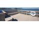 Dock with wooden railings, built-in benches and water views at 100 Bluff View Dr # 409C, Belleair Bluffs, FL 33770