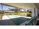 Covered shuffleboard court with benches and seating areas at 100 Bluff View Dr # 409C, Belleair Bluffs, FL 33770