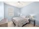 Bedroom with light walls and ceiling fan at 11009 Silver Dancer Dr, Riverview, FL 33579