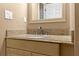 Bathroom sink with granite countertop and light wood cabinets at 11918 Dietz Dr # 28, Tampa, FL 33626