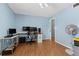 Large bedroom with wood floors, fan and natural light at 11918 Dietz Dr # 28, Tampa, FL 33626
