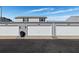 View of three single car garages with white doors and gray siding at 11918 Dietz Dr # 28, Tampa, FL 33626