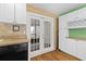 Kitchen area with breakfast nook and double glass doors at 11918 Dietz Dr # 28, Tampa, FL 33626