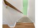 Stairway with wood handrail and new carpet runner leading to upper level at 11918 Dietz Dr # 28, Tampa, FL 33626
