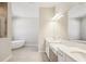 Bright bathroom with a soaking tub, double sinks, and modern fixtures at 12817 Daleridge Pl, Riverview, FL 33579