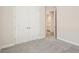 Neutral bedroom with large closet and carpet floors at 12817 Daleridge Pl, Riverview, FL 33579