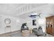 Bright and airy living room with stylish decor, comfortable seating, and unique nautical accents at 129 94Th Ave, Treasure Island, FL 33706