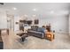 Spacious living room open to kitchen offers a great layout for entertaining at 14916 Imperial Purple Ln, Wimauma, FL 33598