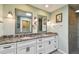 Beautiful bathroom featuring double sinks, granite counters and updated fixtures at 1735 Flamingo Ln, Sun City Center, FL 33573