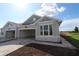 New construction featuring a three car garage, stone accents, and craftsman architectural details at 2828 Marrakesh Ln, Sarasota, FL 34234