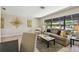 Bright living room offers lots of natural light and neutral finishes at 3034 Gull Pl, Clearwater, FL 33762