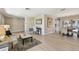 This open concept room provides easy access to dining and outdoor spaces at 3034 Gull Pl, Clearwater, FL 33762