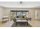 Inviting living room offering lots of light and views of the outdoors at 3034 Gull Pl, Clearwater, FL 33762