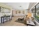 Spacious living room with a decorative wall and lots of natural light at 3034 Gull Pl, Clearwater, FL 33762