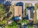Aerial view of the home showcasing the roof, surrounding yard, and street access at 3101 N 15Th St, Tampa, FL 33605