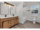 Bathroom boasting double vanity, modern fixtures, and a combined shower and tub at 3101 N 15Th St, Tampa, FL 33605