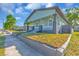 Charming bungalow with a welcoming front porch, well-maintained lawn, and stylish exterior accents at 3101 N 15Th St, Tampa, FL 33605