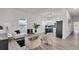 Bright living room showcasing modern furnishings, open layout, and seamless flow into the kitchen at 3101 N 15Th St, Tampa, FL 33605