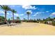 Community park offers a relaxing outdoor space and is nicely landscaped with bench seating and shade at 34329 Evergreen Hill Ct, Wesley Chapel, FL 33545