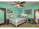 This bright bedroom offers natural light and ceiling fan, providing a simple, comfortable space at 4127 53Rd S Ave, St Petersburg, FL 33711