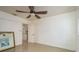 The bright bedroom features neutral wall colors, tiled floors and is connected to the rest of the house at 4127 53Rd S Ave, St Petersburg, FL 33711