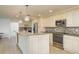 Stylish kitchen features stainless appliances, granite counters, and a large island at 4127 53Rd S Ave, St Petersburg, FL 33711